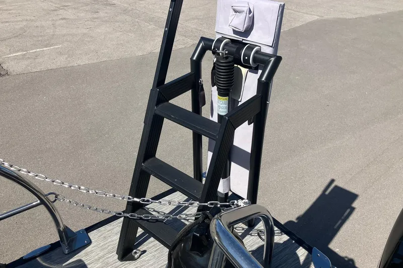 Slide: The Image of 2023 Barletta CORSA 25UE boat ladder with safety chains on deck. - 19