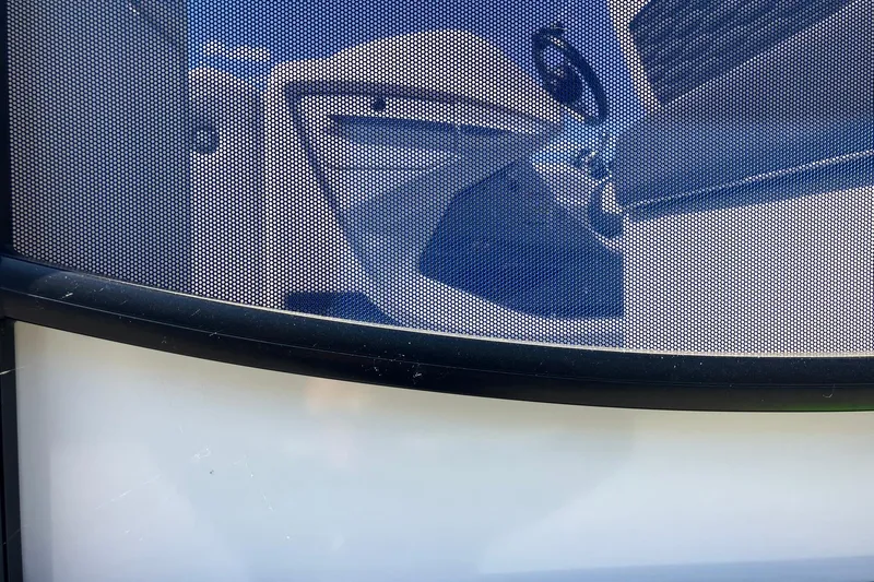Slide: The Image of 2023 Barletta CORSA 25UE boat interior through mesh window. - 23