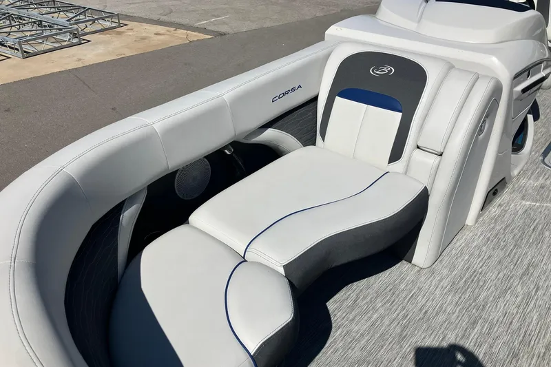Slide: The Image of 2023 Barletta CORSA 25UE boat interior with luxurious seating and modern design. - 6