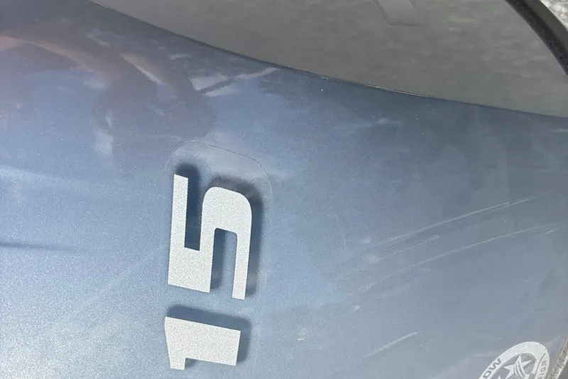 Slide: The Image of Close-up of 2024 Hurricane SS vehicle hood with '15' decal. - 11