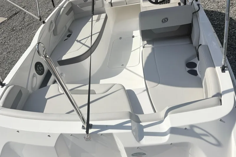 Slide: The Image of 2024 Hurricane SS boat interior with spacious seating and modern design. - 12