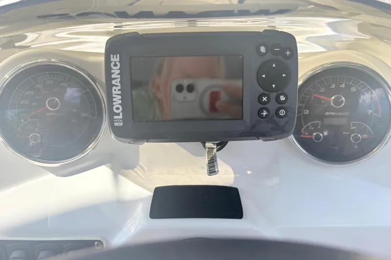 Slide: The Image of Dashboard of 2024 Hurricane SS boat with Lowrance GPS and gauges. - 19