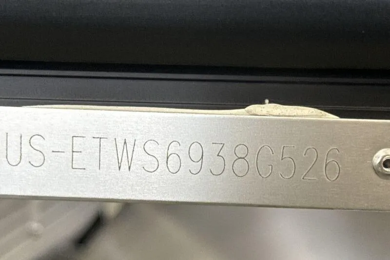 Slide: The Image of 2026 Bennington 22 SSRSE boat seating with beige upholstery and logo. - 19