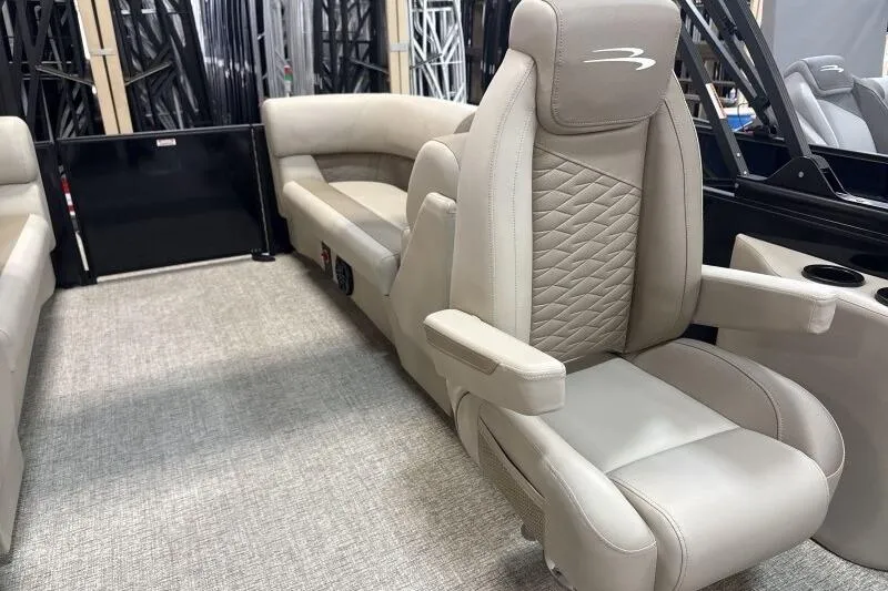 Slide: The Image of Luxurious seating in 2026 Bennington 22 SSRSE pontoon boat interior. - 24