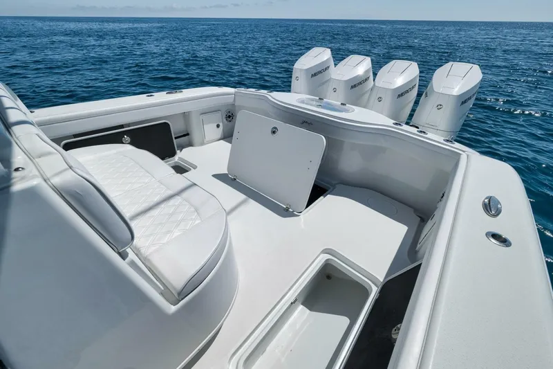Slide: The Image of 2023 Yellowfin 39 Offshore boat with quad Mercury engines on open sea. - 19