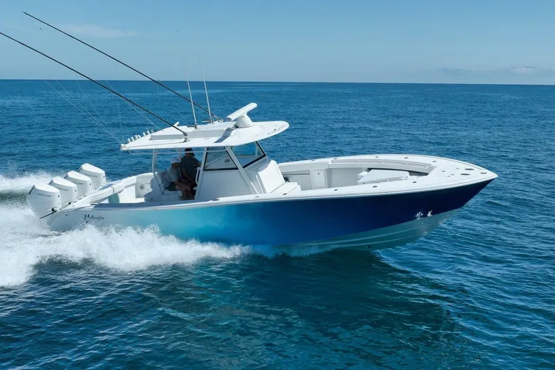Slide: The Image of 2023 Yellowfin 39 Offshore boat cruising on open ocean waters. - 30