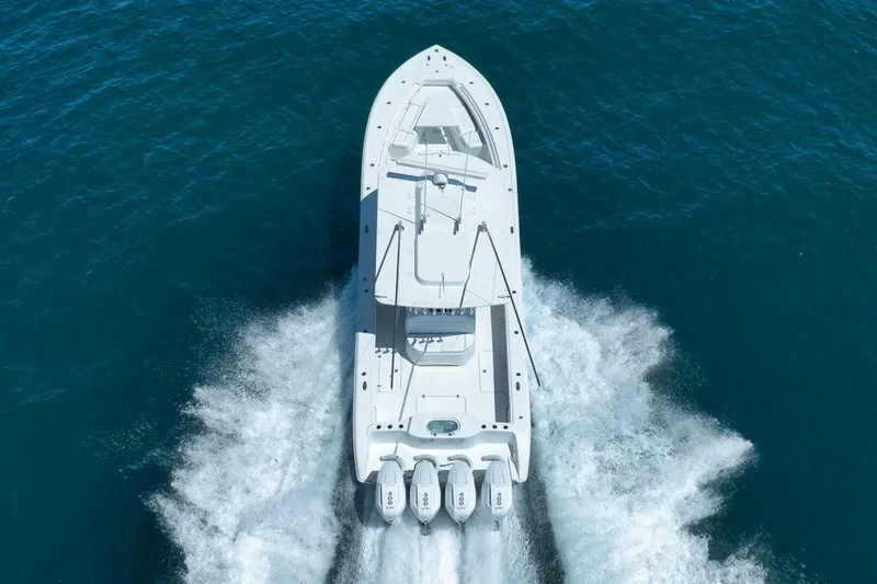 Slide: The Image of 2023 Yellowfin 39 Offshore boat cruising on open blue water. - 33