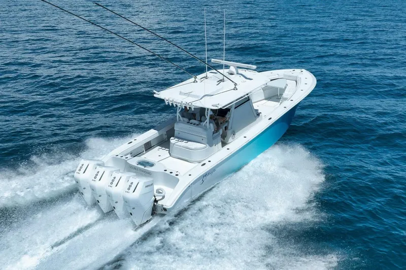 Slide: The Image of 2023 Yellowfin 39 Offshore boat cruising on open blue water. - 6