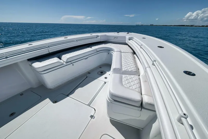 Slide: The Image of 2023 Yellowfin 39 Offshore boat with spacious seating on open ocean. - 7
