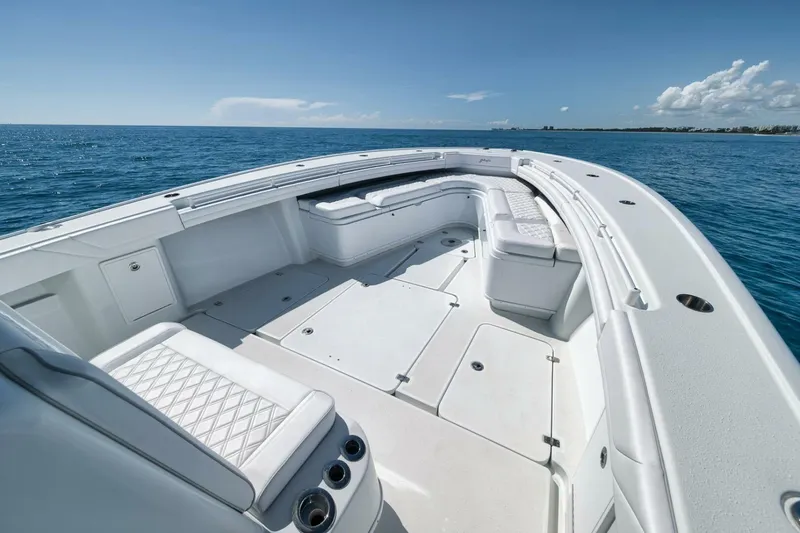 Slide: The Image of 2023 Yellowfin 39 Offshore boat with spacious seating on open ocean. - 8