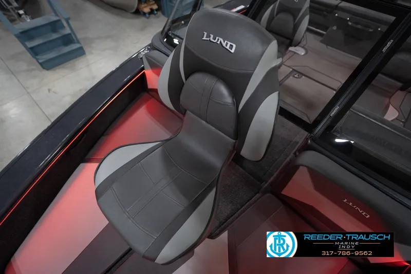 Slide: The Image of 2026 Lund 1875 Crossover XS boat interior with sleek seating and modern design. - 47