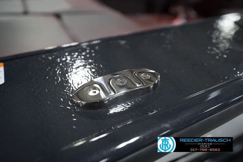 Slide: The Image of Close-up of 2026 Lund 1875 Crossover XS boat detail with metallic finish. - 61