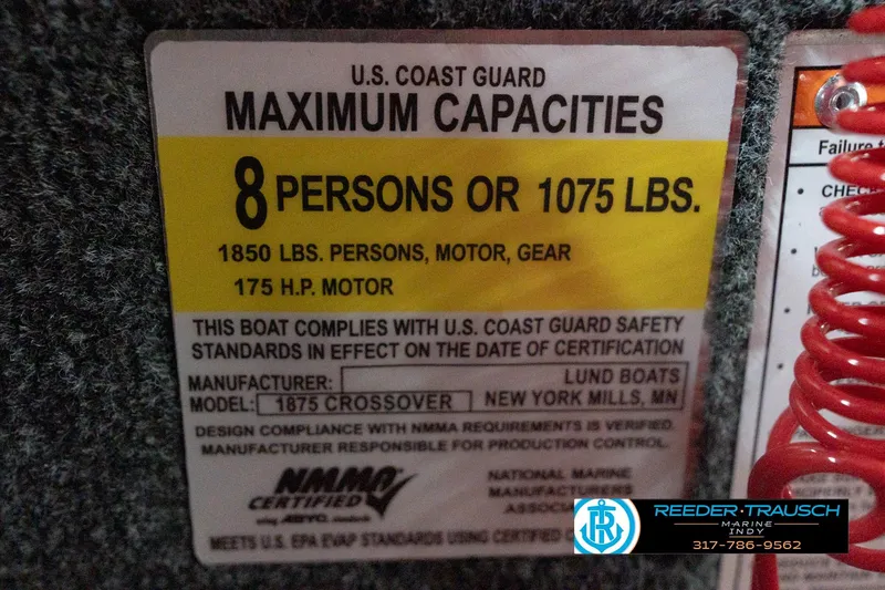 Slide: The Image of 2026 Lund 1875 Crossover XS capacity label, 8 persons or 1075 lbs, 175 HP motor. - 63
