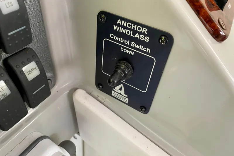 Slide: The Image of Control panel of 2005 Formula 330 Sun Sport with anchor windlass switch. - 16