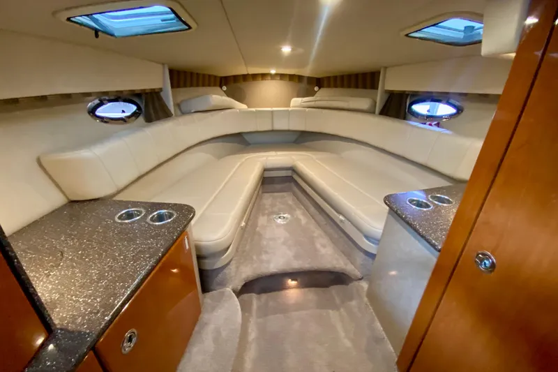 Slide: The Image of Luxurious interior of a 2005 Formula 330 Sun Sport boat with plush seating and elegant finishes. - 20