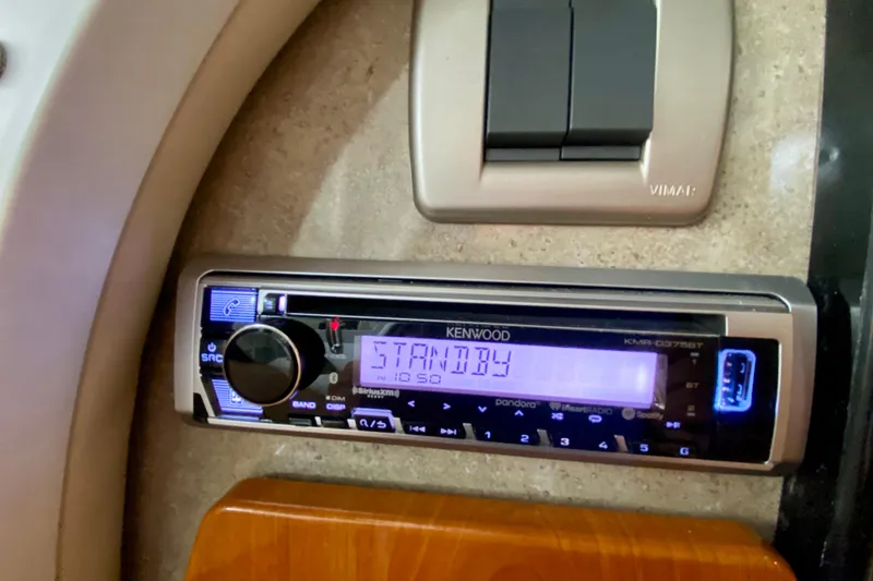 Slide: The Image of Kenwood stereo system in 2005 Formula 330 Sun Sport boat interior. - 29