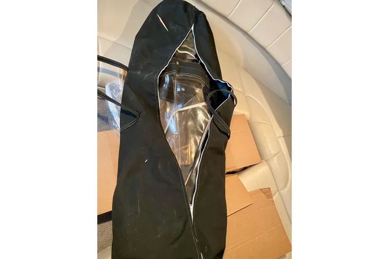 Slide: The Image of Black bag with transparent window on a 2005 Formula 330 Sun Sport boat seat. - 31