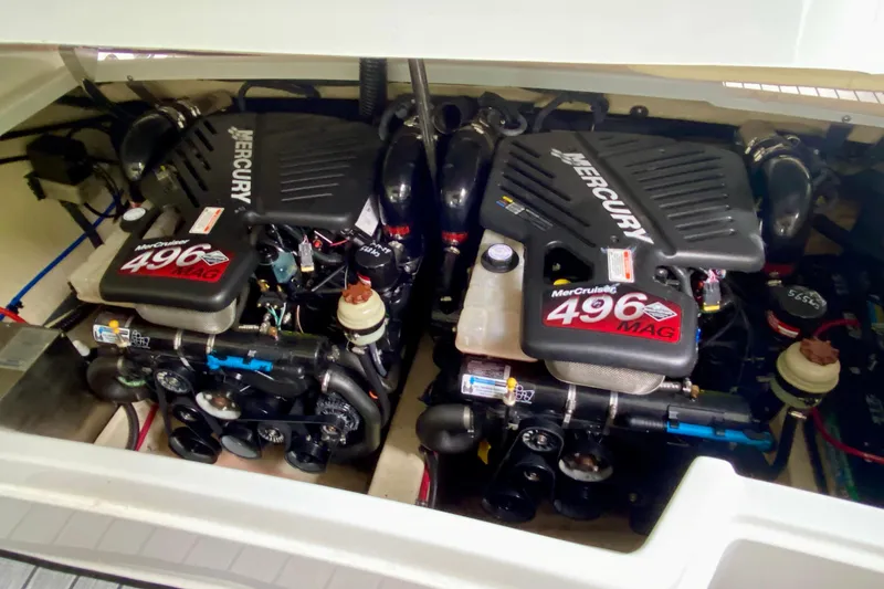 Slide: The Image of Twin MerCruiser 496 MAG engines in a 2005 Formula 330 Sun Sport boat. - 33