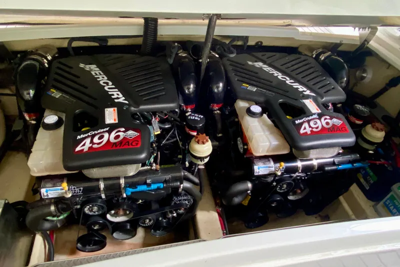 Slide: The Image of Twin MerCruiser 496 MAG engines in a 2005 Formula 330 Sun Sport boat. - 34