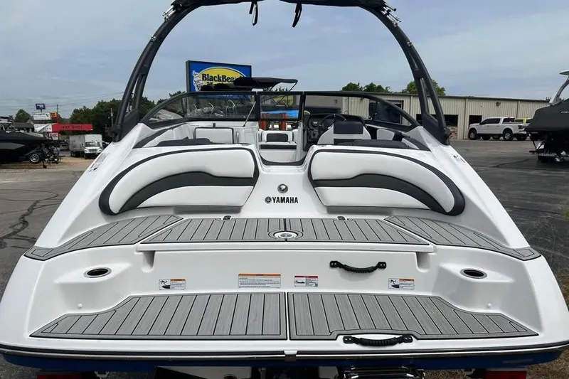 Slide: The Image of 2026 Yamaha Boats AR195, sleek design, rear view, spacious seating, modern features. - 5