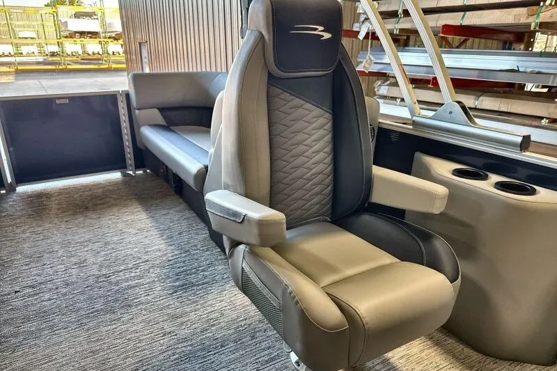 Slide: The Image of Luxurious seating in 2026 Bennington 22 SSRSE pontoon boat interior. - 25