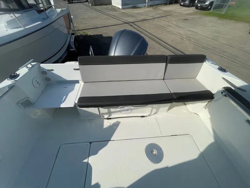 Slide: The Image of 2022 Jeanneau NC Weekender 795 Series 2 boat interior with cushioned seating. - 14