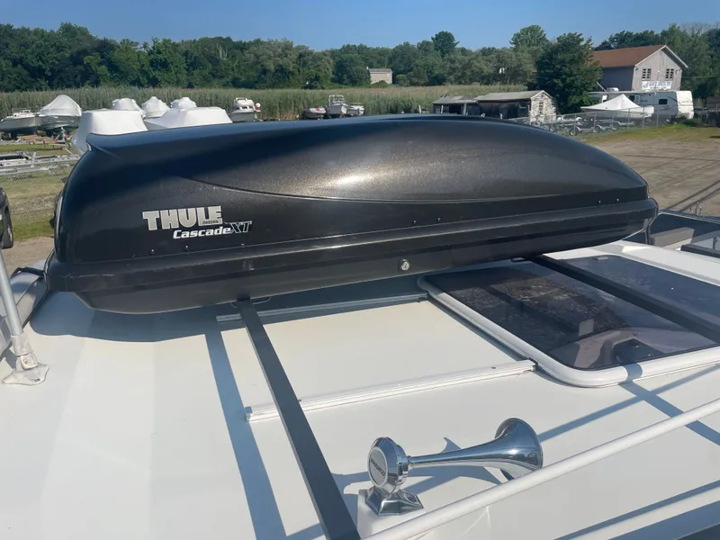 Slide: The Image of Roof of 2022 Jeanneau NC Weekender 795 with Thule Cascade XT cargo box. - 15