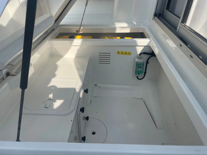 Slide: The Image of Interior storage compartment of 2022 Jeanneau NC Weekender 795 Series 2 boat. - 18