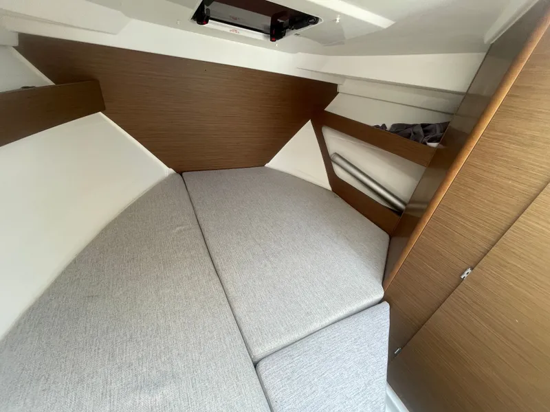 Slide: The Image of Interior cabin of 2022 Jeanneau NC Weekender 795 Series 2 with cozy bedding. - 29