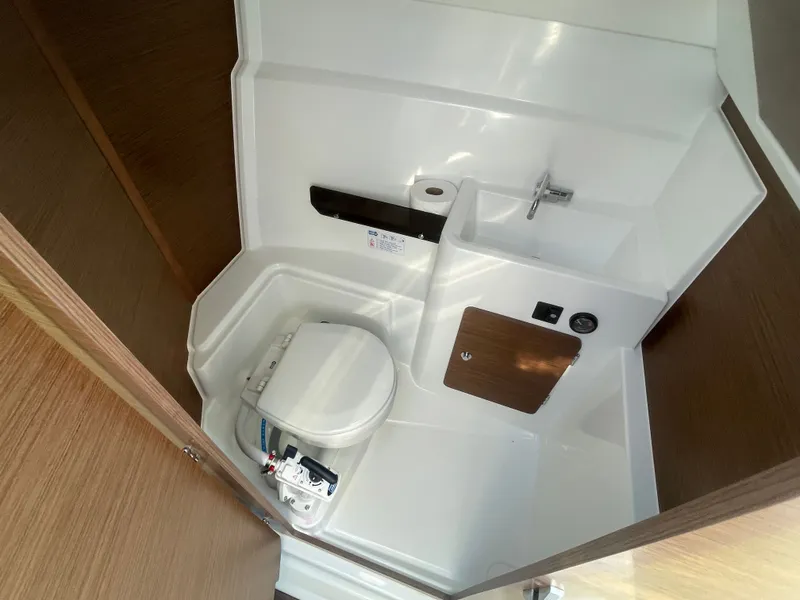 Slide: The Image of Compact bathroom in 2022 Jeanneau NC Weekender 795 Series 2 boat. - 30