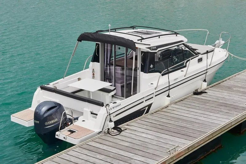 Slide: The Image of Manufacturer Provided Image: 2022 Jeanneau NC Weekender 795 Series 2 docked, rear view. - 34