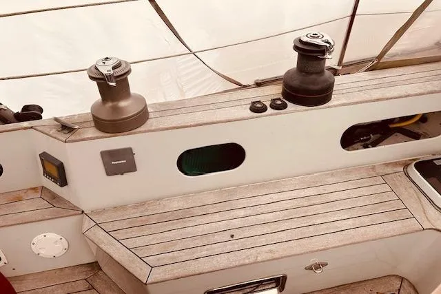 Slide: The Image of Deck of 1993 Brooklin Boat Yard Marshall 48 with winches and wooden finish. - 59