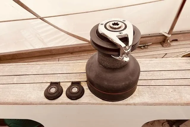 Slide: The Image of Winch on 1993 Brooklin Boat Yard Marshall 48 deck, with two rope clutches. - 72