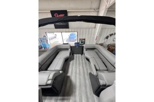 Slide: The Image of 2025 Bennington 22M FASTBACK pontoon boat interior with spacious seating and modern design. - 6