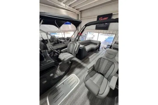 Slide: The Image of 2025 Bennington 22M FASTBACK boat interior with modern seating and sleek design. - 9