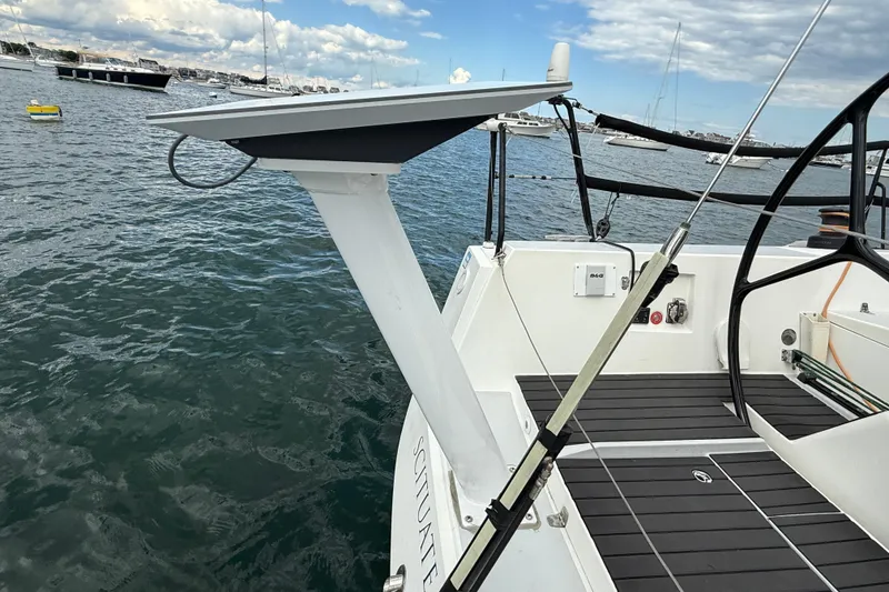 Slide: The Image of 2013 J Boats J/122 sailboat deck with steering wheel and ocean view. - 18