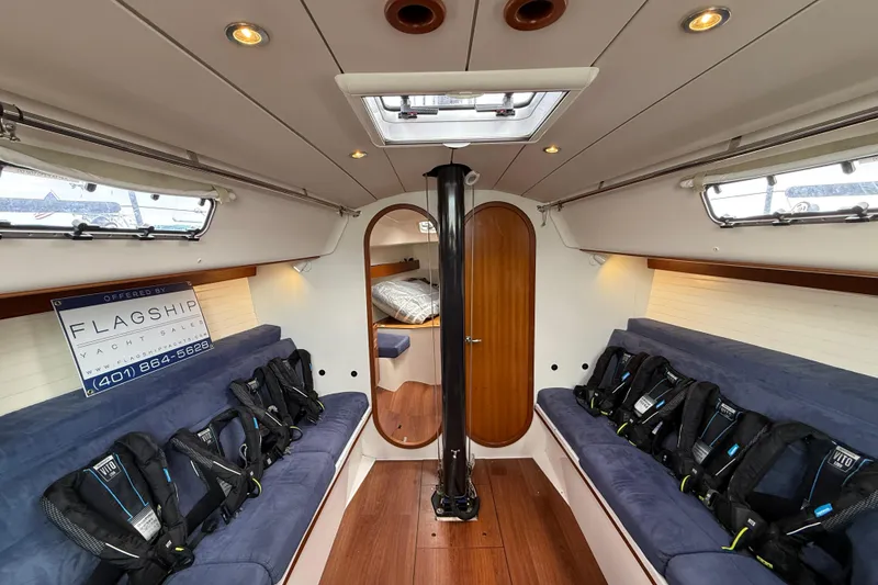 Slide: The Image of Interior of 2013 J Boats J/122 yacht with seating and life vests. - 33