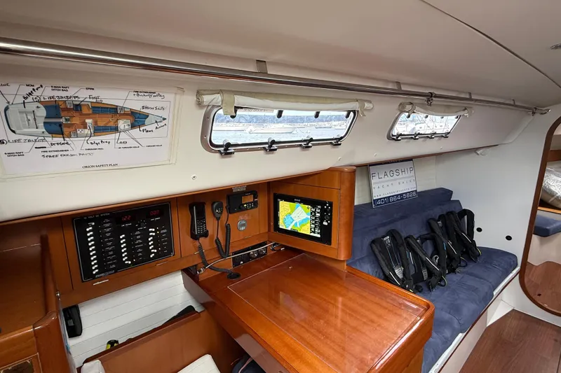 Slide: The Image of Interior of 2013 J Boats J/122 yacht with navigation equipment and seating area. - 36