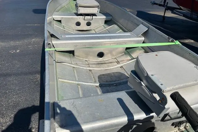 Slide: The Image of 1972 Sea Nymph 140 Angler boat interior with seating and storage compartments. - 4