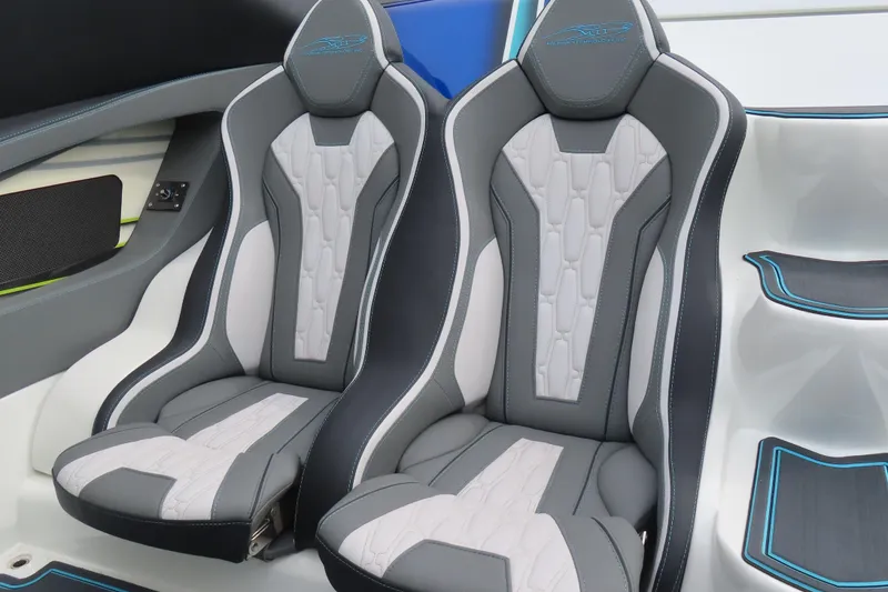 Slide: The Image of Luxury seating in 2022 MTI 48 model, featuring sleek gray and white design. - 10