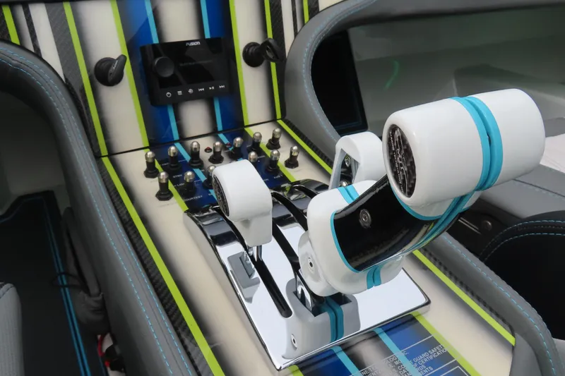 Slide: The Image of Interior of 2022 MTI 48 boat with advanced control panel and sleek design. - 13