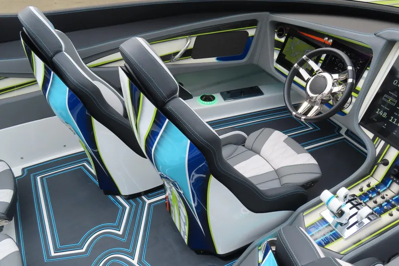 Slide: The Image of Interior of a 2022 MTI 48 boat featuring modern design and advanced controls. - 15