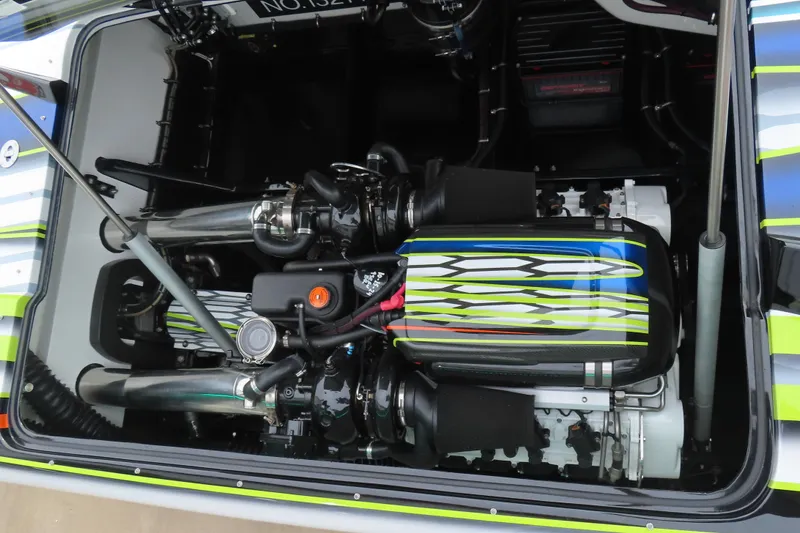 Slide: The Image of 2022 MTI 48 engine compartment with vibrant custom paint design. - 18