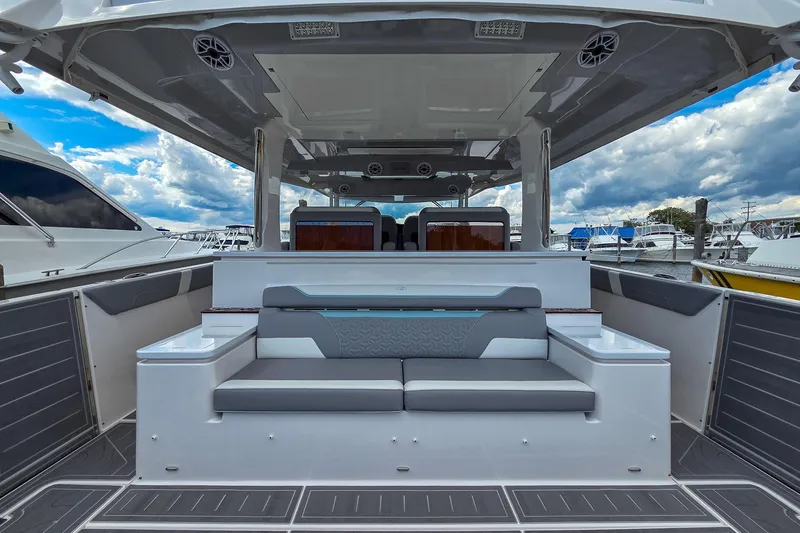 Slide: The Image of Luxurious 2025 Regal 50 SAV yacht interior with sleek seating and modern design. - 16