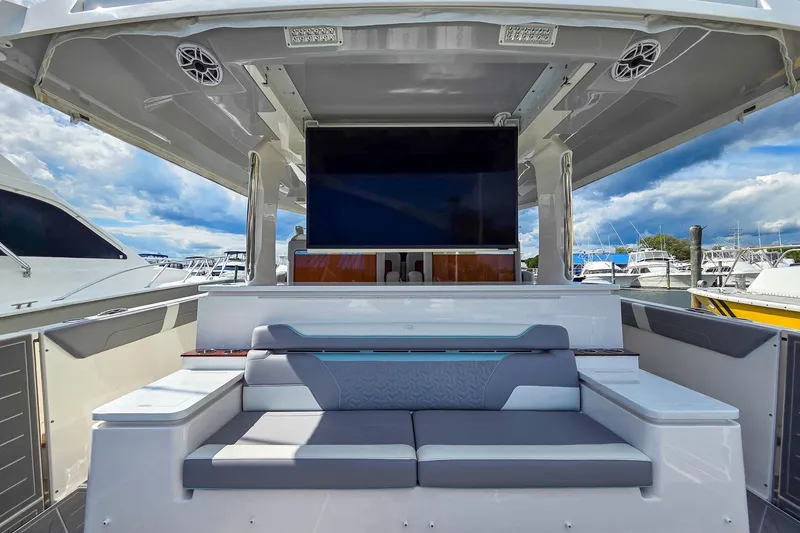 Slide: The Image of Luxurious 2025 Regal 50 SAV yacht interior with plush seating and modern amenities. - 18