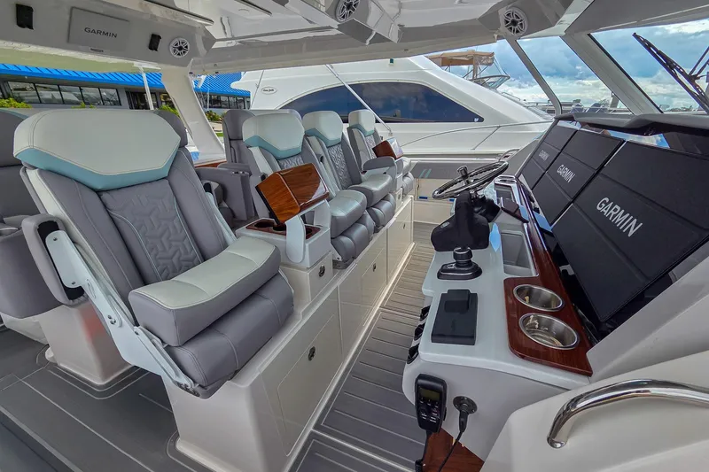 Slide: The Image of Luxurious interior of 2025 Regal 50 SAV yacht with advanced Garmin navigation system. - 35