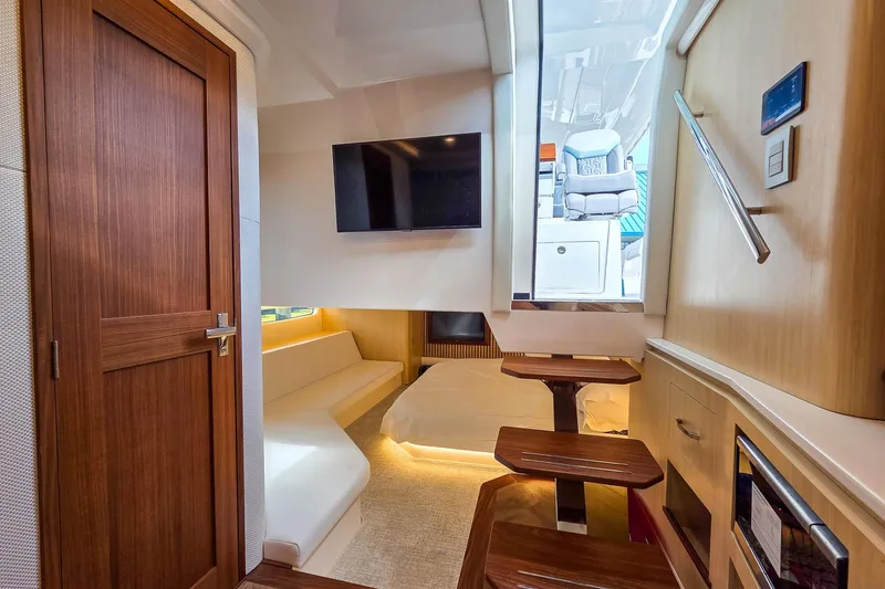 Slide: The Image of Luxurious interior of 2025 Regal 50 SAV yacht with modern amenities and elegant design. - 42