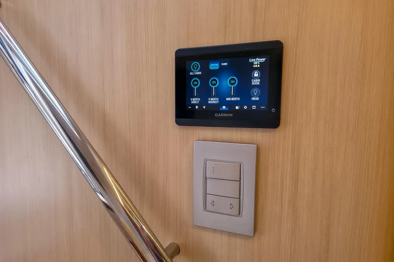 Slide: The Image of Control panel and switches on 2025 Regal 50 SAV yacht interior. - 44