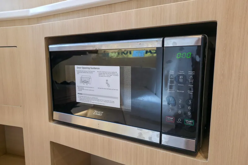 Slide: The Image of Built-in microwave in 2025 Regal 50 SAV yacht kitchen. - 45