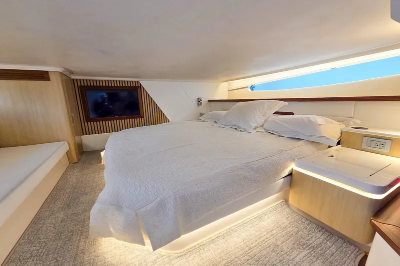 Slide: The Image of Luxurious cabin interior of 2025 Regal 50 SAV yacht with modern amenities. - 48